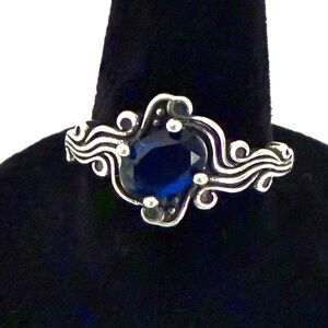 Sterling Silver Dark Blue Topaz Oval Stone Ring with Scrollwork Sz 7